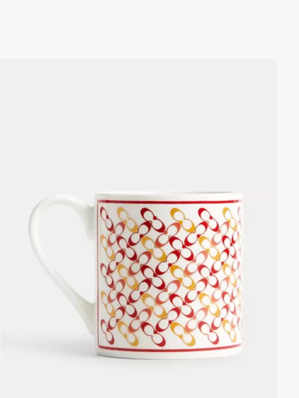 Coach White Mug with Red and Yellow Interlocking Chain Motif